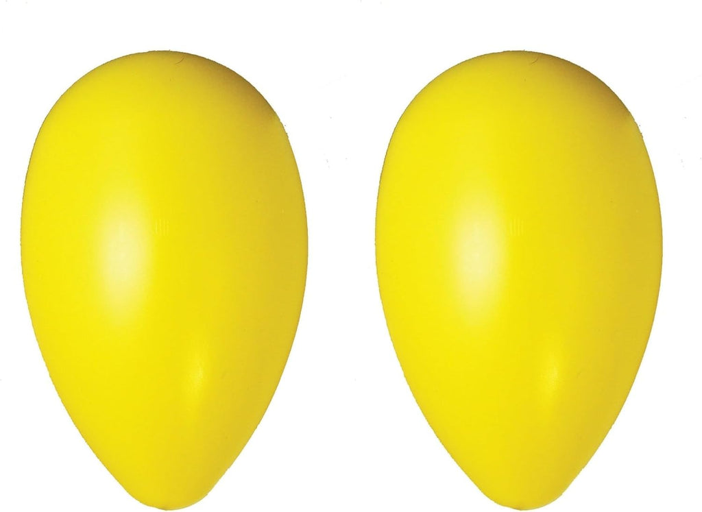 Durable yellow Jolly Egg dog toy on grass