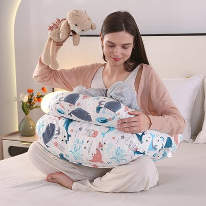 Mom using Babylian ergonomic feeding pillow for support