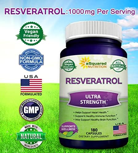 Close up of antioxidant supplement capsules pouring out of bottle