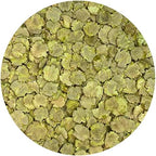 Exotic Nutrition green pea flakes close up of natural texture