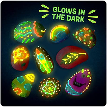 Close up view of the four fluorescent luminous paint tubes and six standard colorful acrylic paint pots with two paintbrushes.
