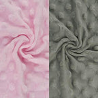 BlueSnail changing pad cover 2-pack laid out flat in natural nursery lighting
