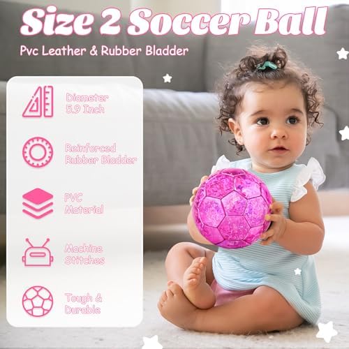 DLUGOPIS pink mini sports ball for kids being held to demonstrate small size 2 scale.