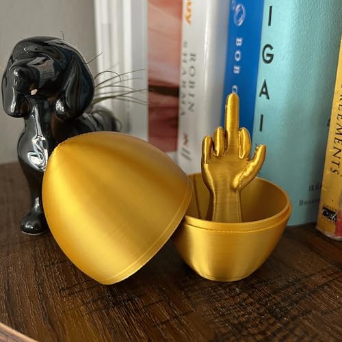 Open two piece 3D printed prank egg revealing hidden middle finger gesture