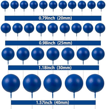 Royal blue foam ball toppers inserted into a party cake