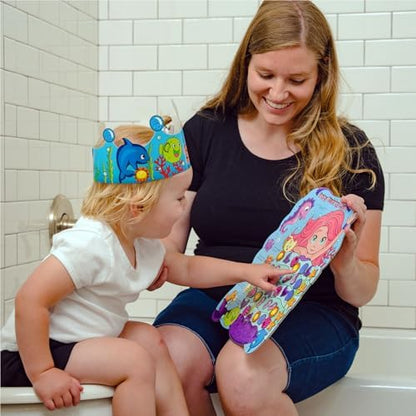 Toddler using Putska potty training reward chart in bathroom