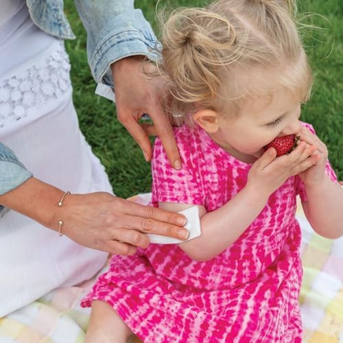 Biodegradable insect protection wipes for diaper bags showing product thickness and texture