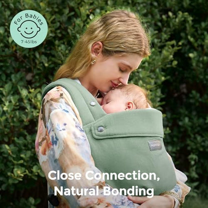 Momcozy ergonomic baby carrier showing M-position support