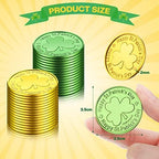 A mix of twenty five gold and twenty five green Skylety plastic lucky clover coins spread out on a table.