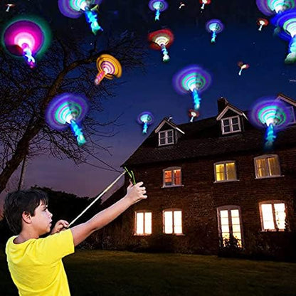 Durable polyvinyl chloride plastic arrow helicopters from JX displayed in multiple colors for party favors.