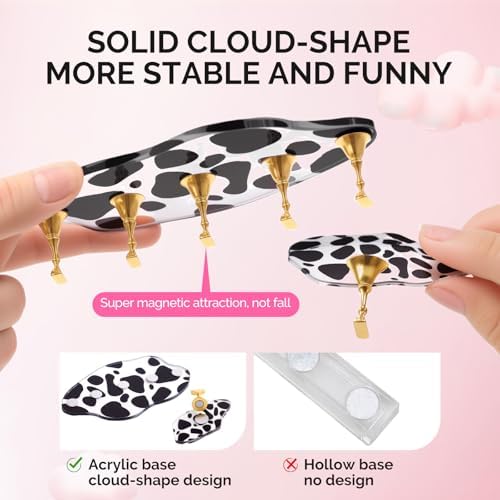 Close up of magnetic nail stands on spotted cloud base