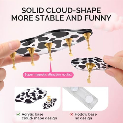 Close up of magnetic nail stands on spotted cloud base