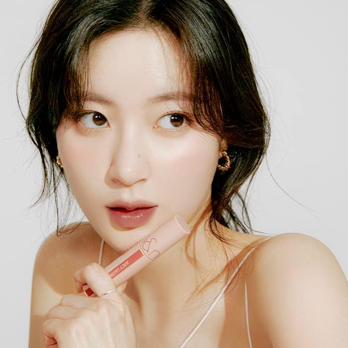 Korean K-Beauty Romand Nucadamia lip tint container displaying the nudy red brown color.