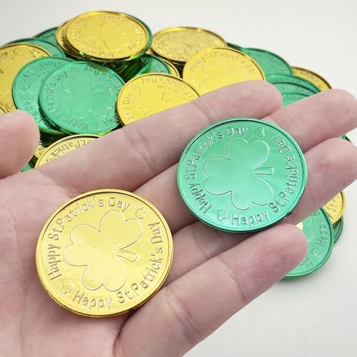 A pile of UOUYOO plastic St Patrick coins scattered on a festive table setting.