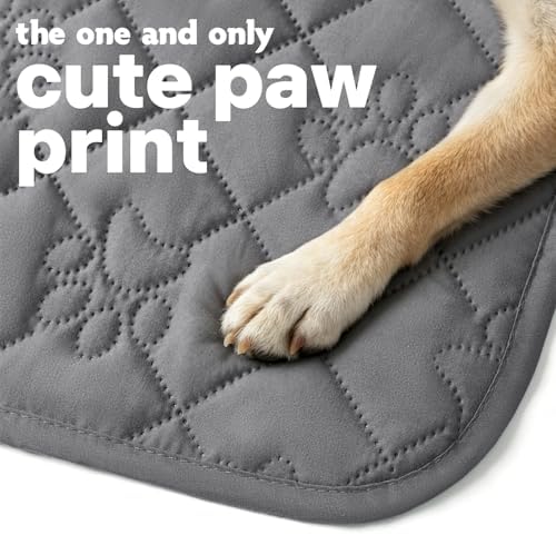 Close up view of the grey paw print quilted pattern on the PAWFINITY furniture protector