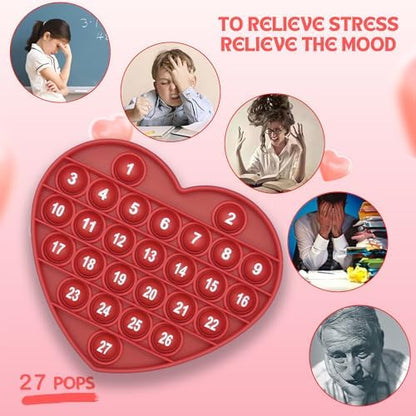 Washable silicone heart pop it toy displaying letters for classroom prizes