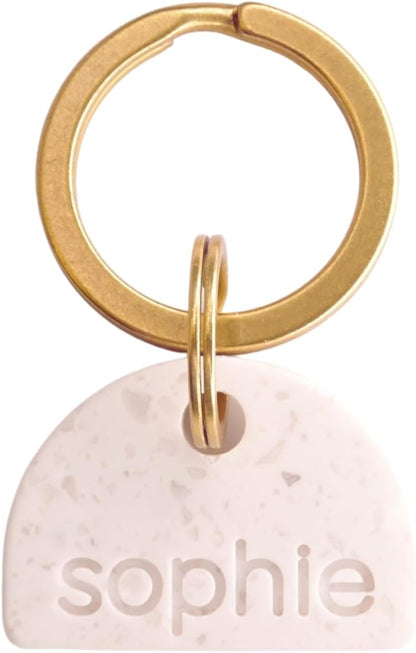 Onoma authentic terrazzo pattern circle tag for premium pet safety.
