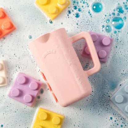 Side angle view of the non toxic BPA free Rinzee silicone baby cup highlighting its ergonomic grip.