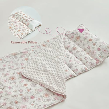 Thick cushioned toddler nap mat being rolled up for school travel