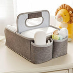 Munchkin grey nursery organizer with included changing pad