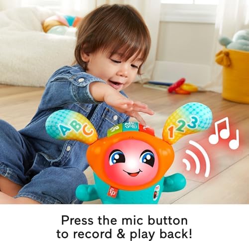 Fisher-Price musical developmental toy displaying active motorized spring jumping action