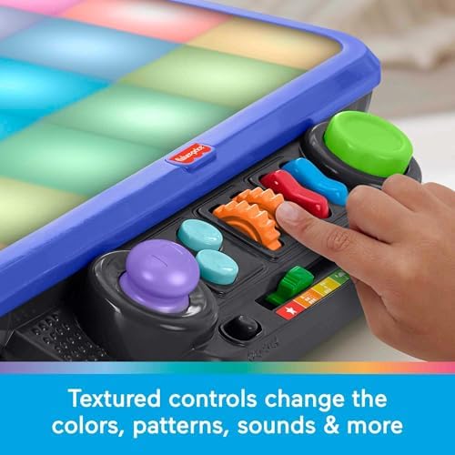 Fisher-Price sensory bright light table illuminating with vibrant customizable colors during an interactive game session.