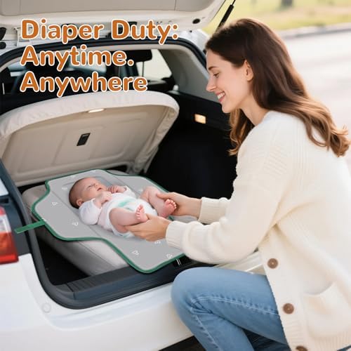 Phoebus Baby newborn essential changing station placed on a car seat for an on the go diaper change