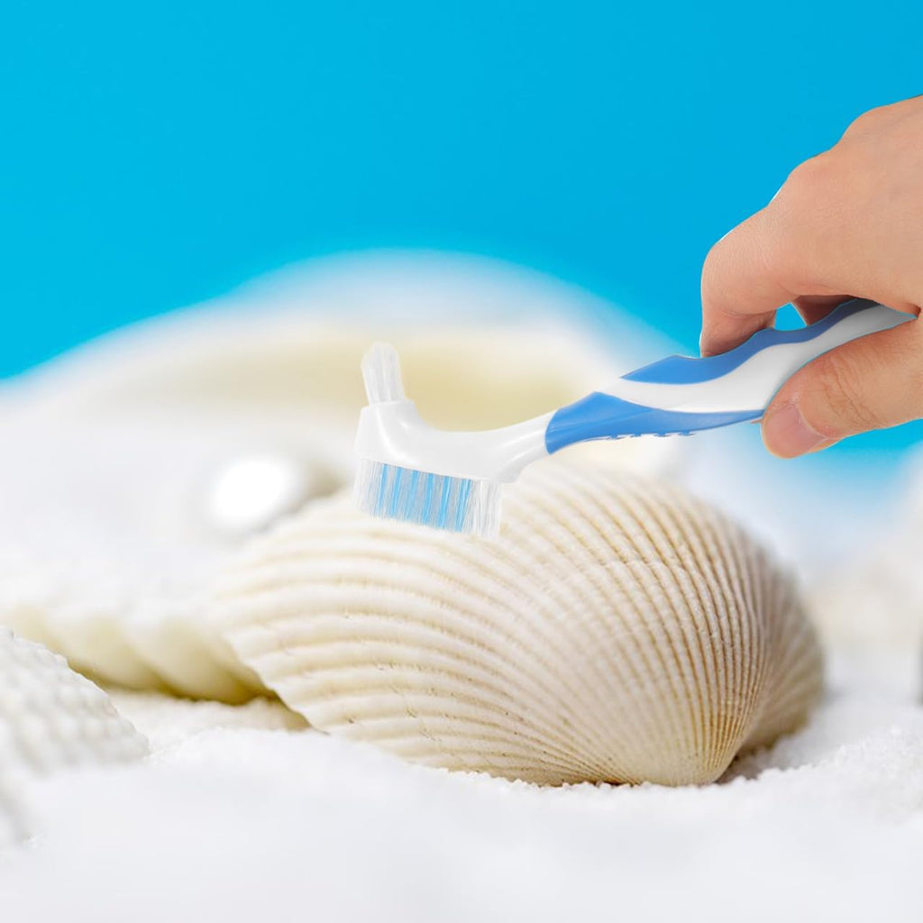 Close up view of the durable bristles on the NOLITOY dual sided pet care brush for aquarium use.