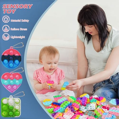 SINFOX bulk sensory toys collection spread out displaying the variety of bright colors and included metal attachment chains