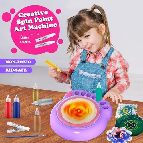 Motorized rotating painting spinner toy set with vibrant paint bottles inserted into storage slots