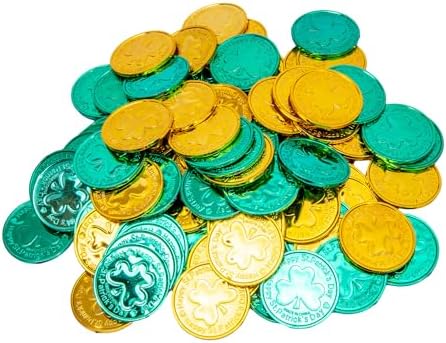 Embossed green and gold Irish themed treasure hunt tokens held in hand for scale
