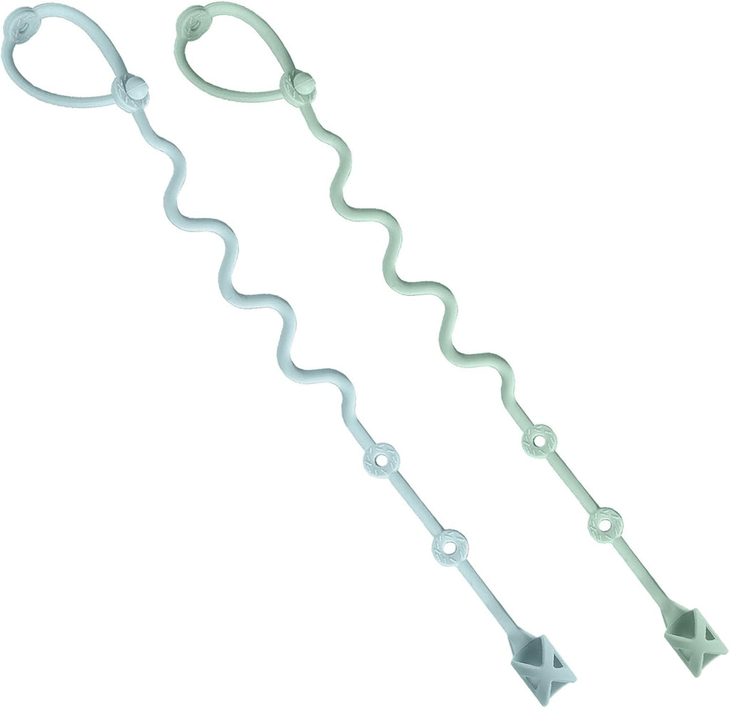 Gelinor baby spoons holder strap front view in green and blue colors attached to a highchair tray.