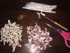 Small yellow rubber bands arranged for top knots and bows