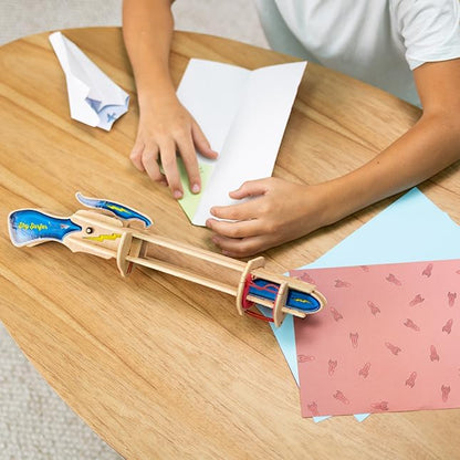 Fat Brain Toys Sky Surfer aerodynamic testing toy with paper plane on launcher.