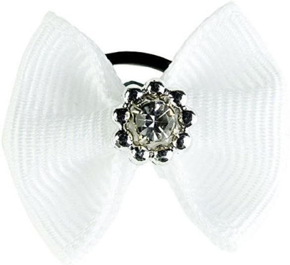 Detailed view of the sparkling diamante gemstone embellishment on the blue tournament bow.