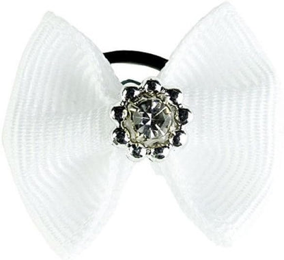Detailed view of the sparkling diamante gemstone embellishment on the blue tournament bow.