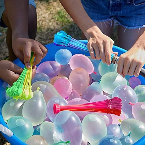Close up view of self sealing water balloons connected to a garden hose adapter.