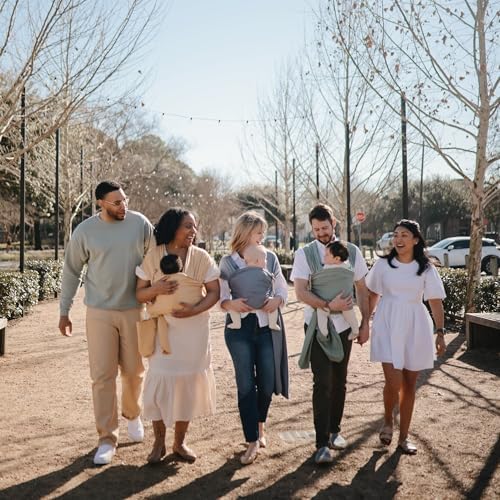 Premium ivory baby wrap carrier by Mushie displayed in full universal length