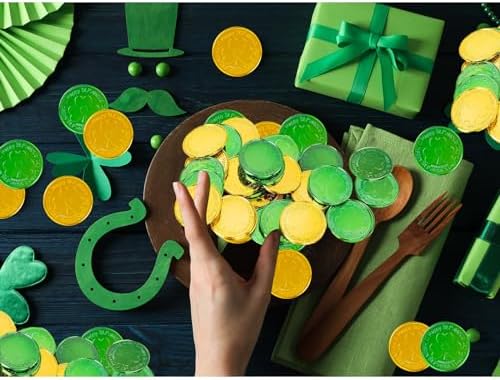 Decorative gold and green coins stored inside a miniature pot of gold.