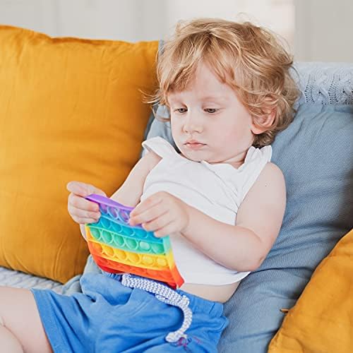 Washable and durable rainbow colored fidget pad resting on an office desk