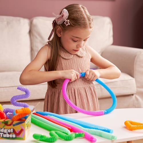 Child using stretchable stress relief fidget tubes for fine motor skills development
