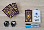 Artist hands customizing Metaphoracle DIY tarot deck