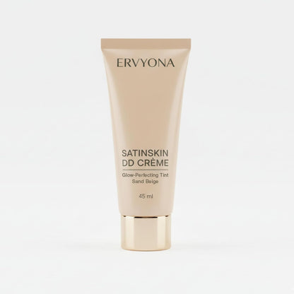 ERVYONA SatinSkin DD Crème front view of the 45 milliliters tube showcasing the Sand Beige shade label for lightweight daily coverage.