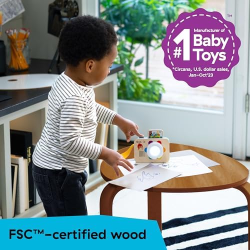 Baby Einstein wooden learning camera featuring the attached nylon wrist strap for easy carrying