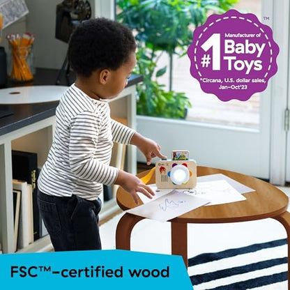 Baby Einstein wooden learning camera featuring the attached nylon wrist strap for easy carrying