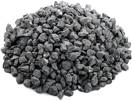 Close up of tumbled gray pea gravel texture