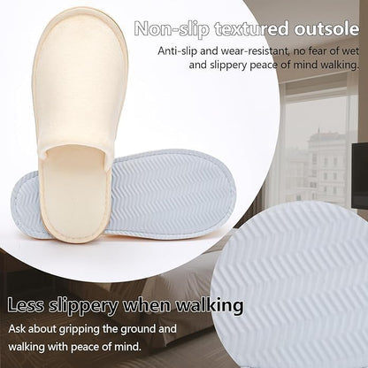 Six pairs of gray unisex spa slippers in travel bag