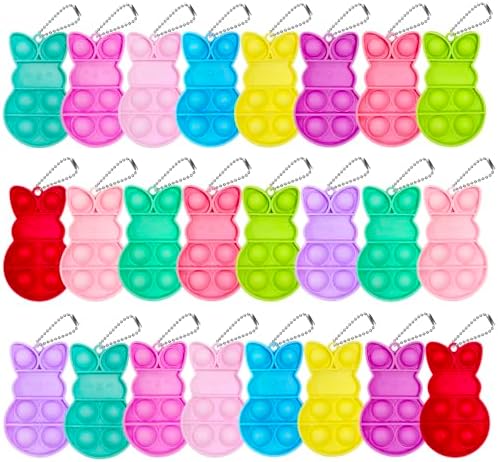 Vibrant pink and blue plastic eggs cracked open to reveal miniature bunny pop bubble fidget toy keychains