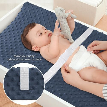 Elastic borders and buckle strap holes on the bottom of the nursery sheet