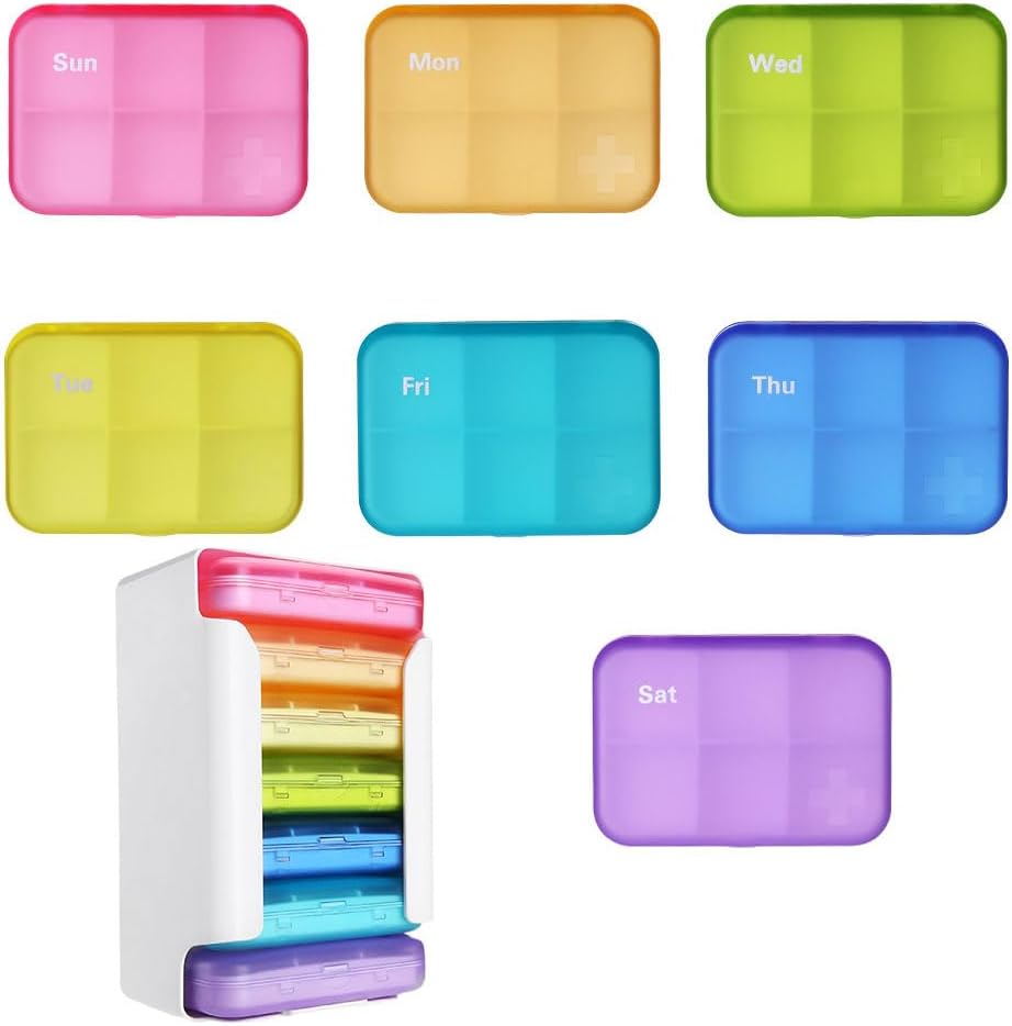 Selectopia 7 piece weekly pill organizer front view showing vertical storage rack with rainbow colored daily boxes